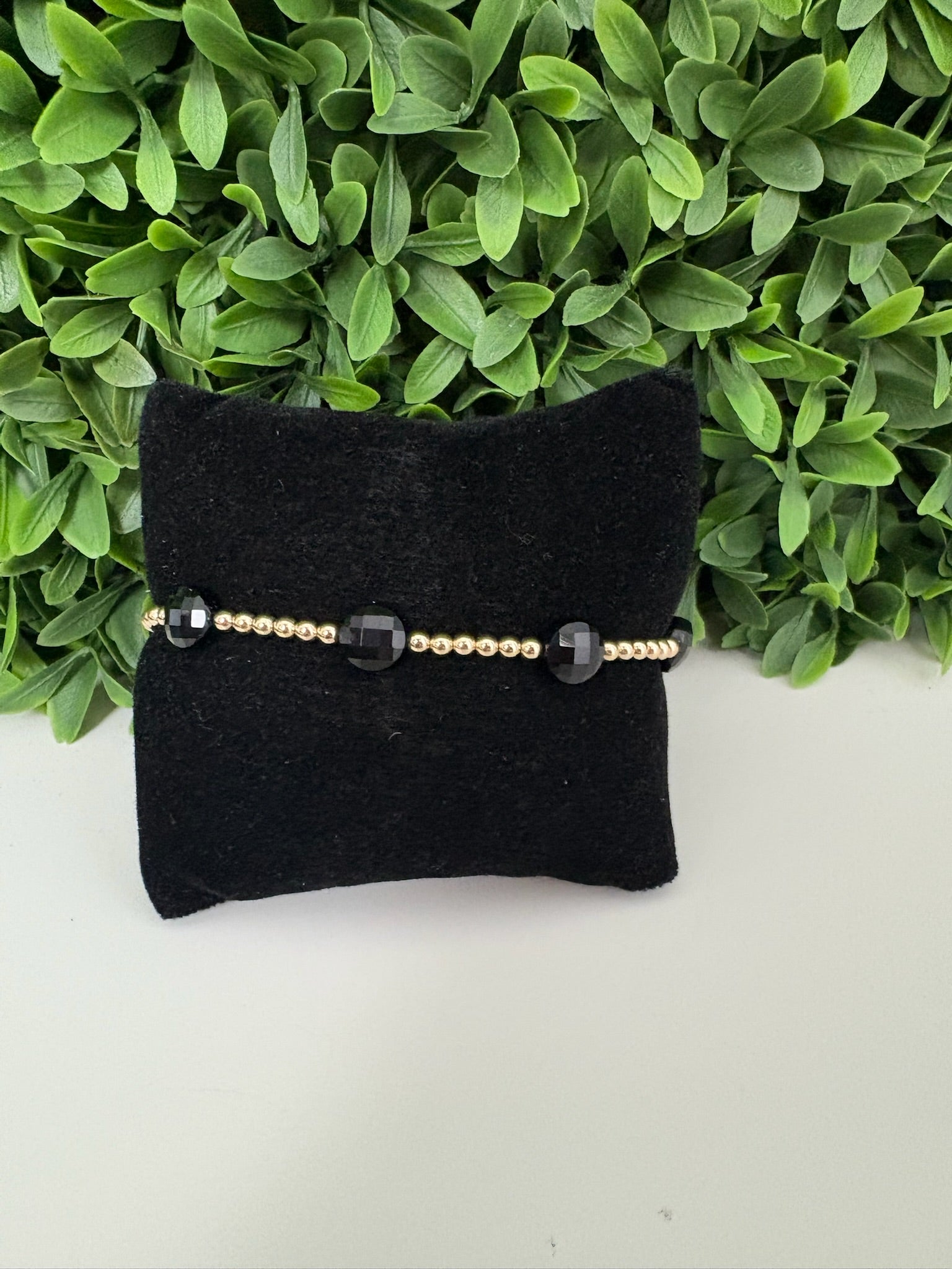 EXT ADMIRE GOLD 3MM BEAD BRAC - FACETED ONYX