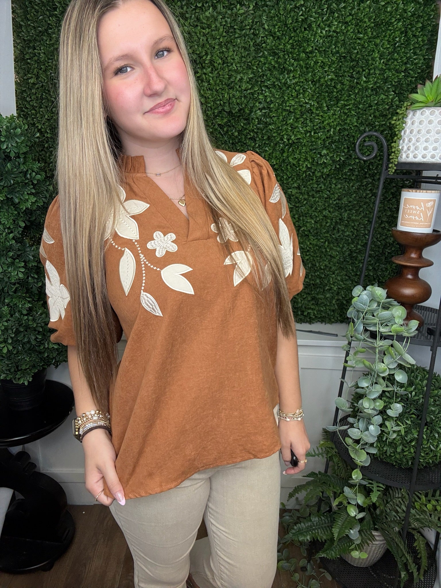 WASHED SUEDE TOP W/CONTRAST FLORAL APPLIQUE - CAMEL