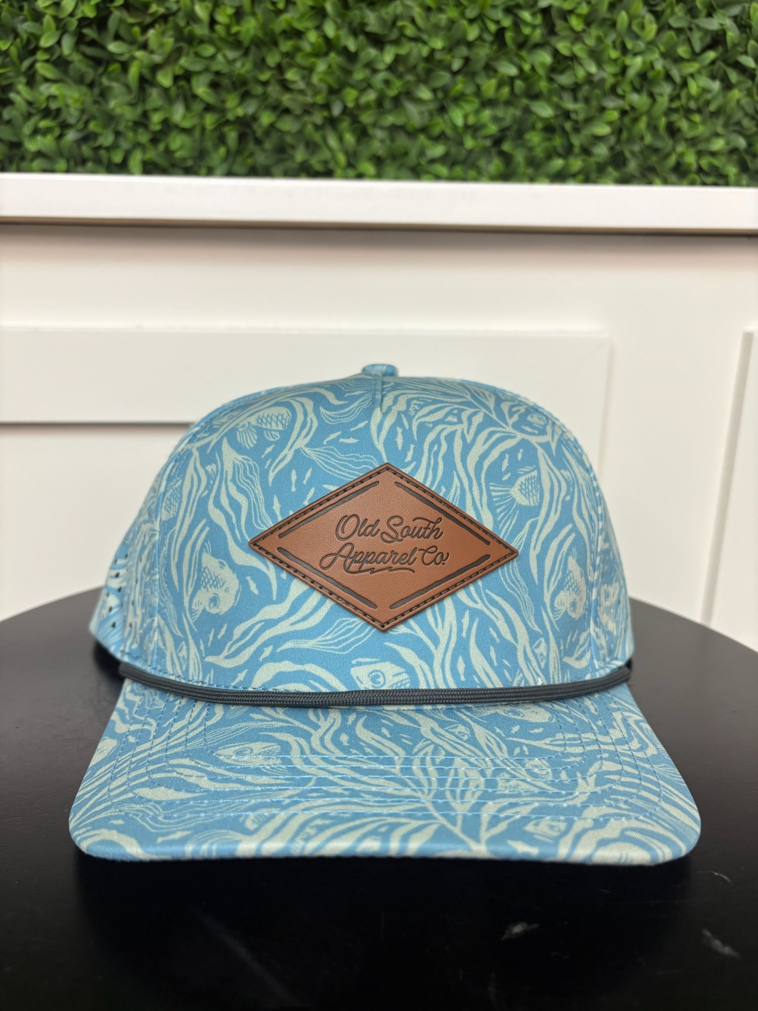 BENEATH THE TIDE LEATHER TRUCKER HAT - CAROLINA BLUE