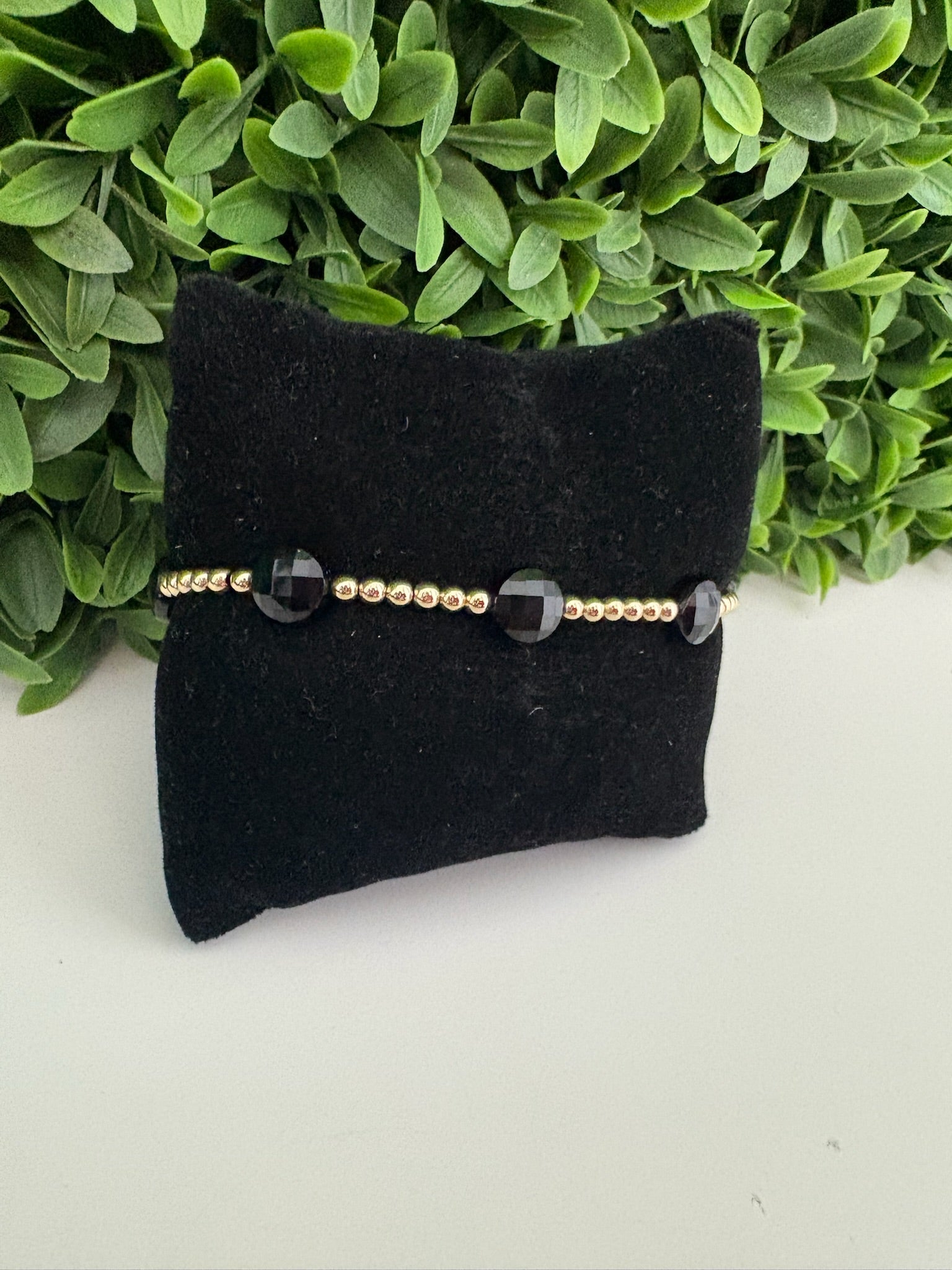 EXT ADMIRE GOLD 3MM BEAD BRAC - FACETED ONYX