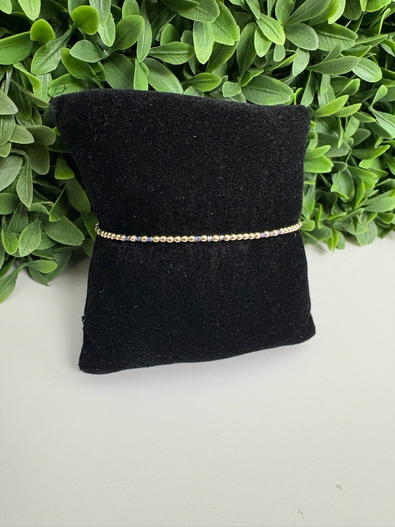 HOPE JOY 2MM BEAD BRACELET - TAUPE WITH A TWIST