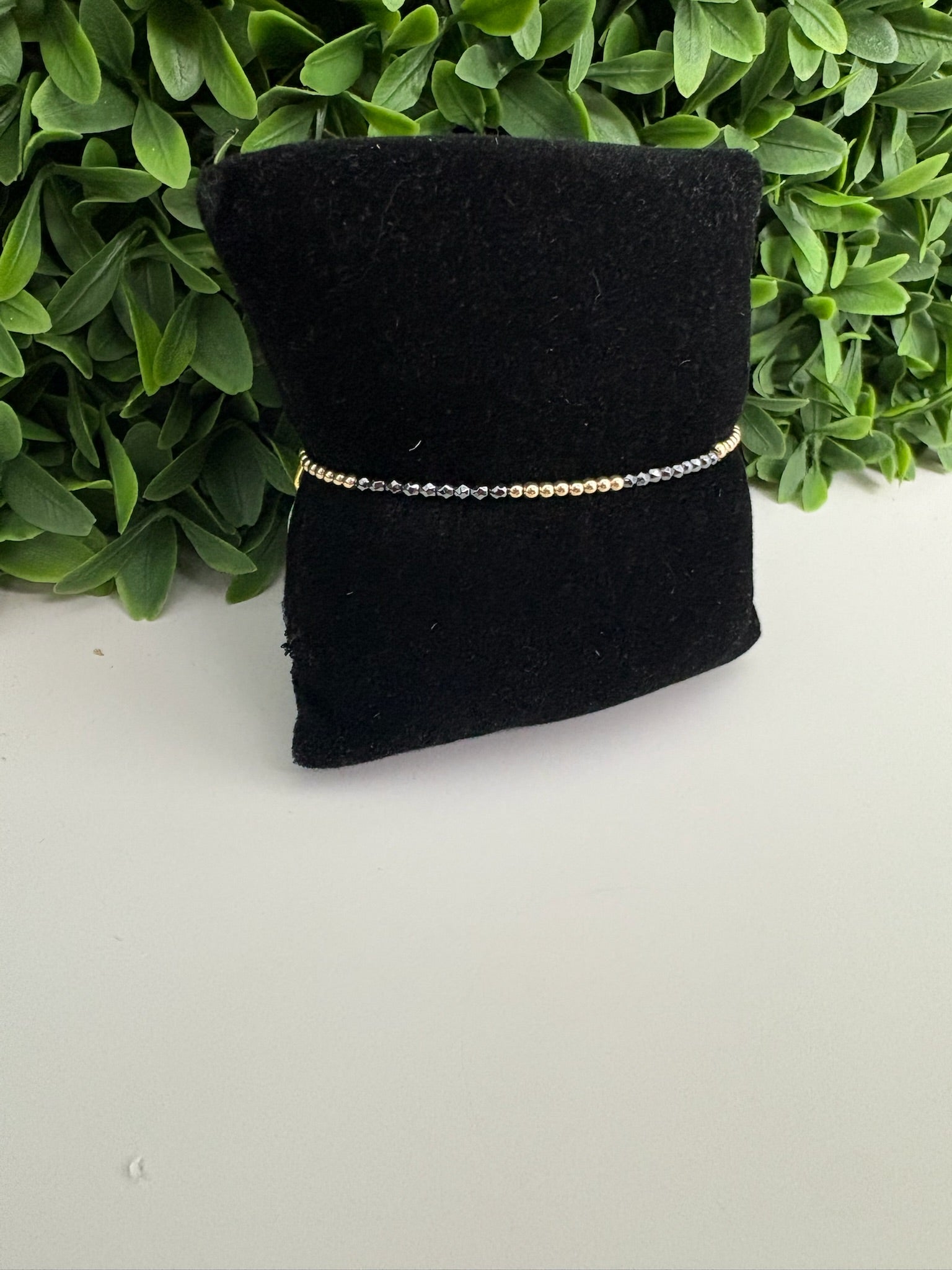 BLISSFUL PATTERN 2MM FACETED HEMATITE