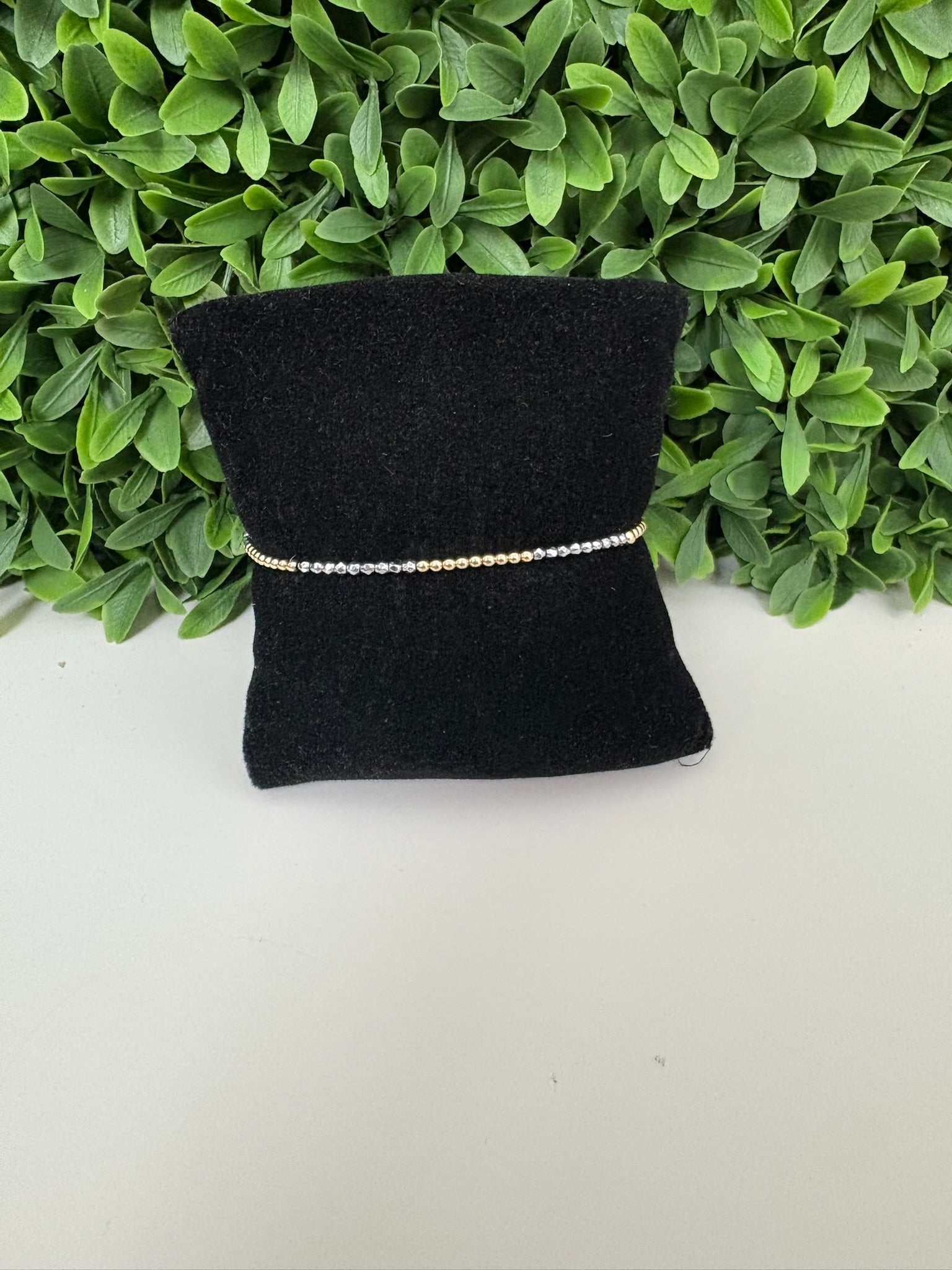 BLISSFUL PATTERN 2MM SILVER FACETED HEMATITE