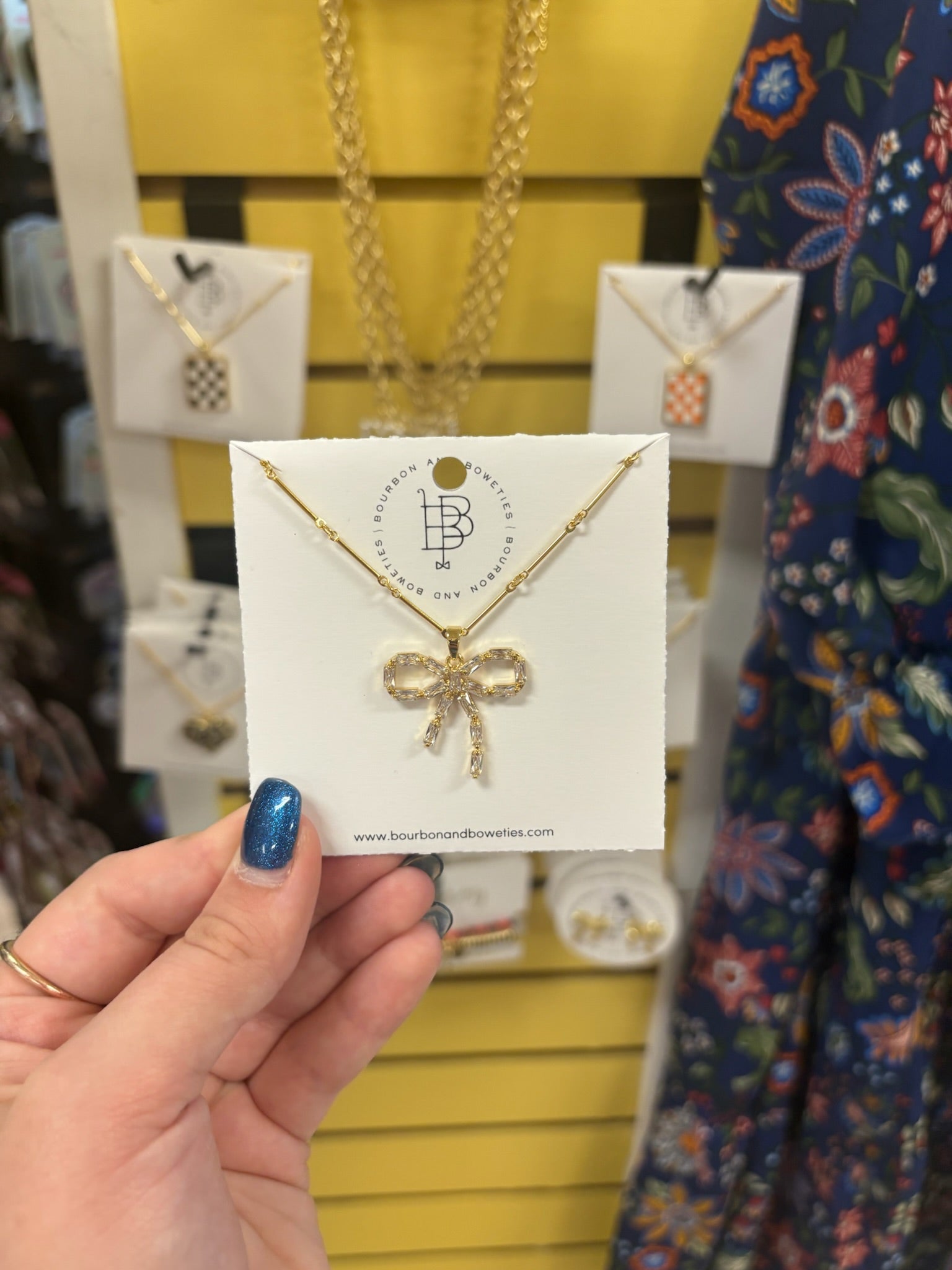 THE RHINESTONE BOW NECKLACE