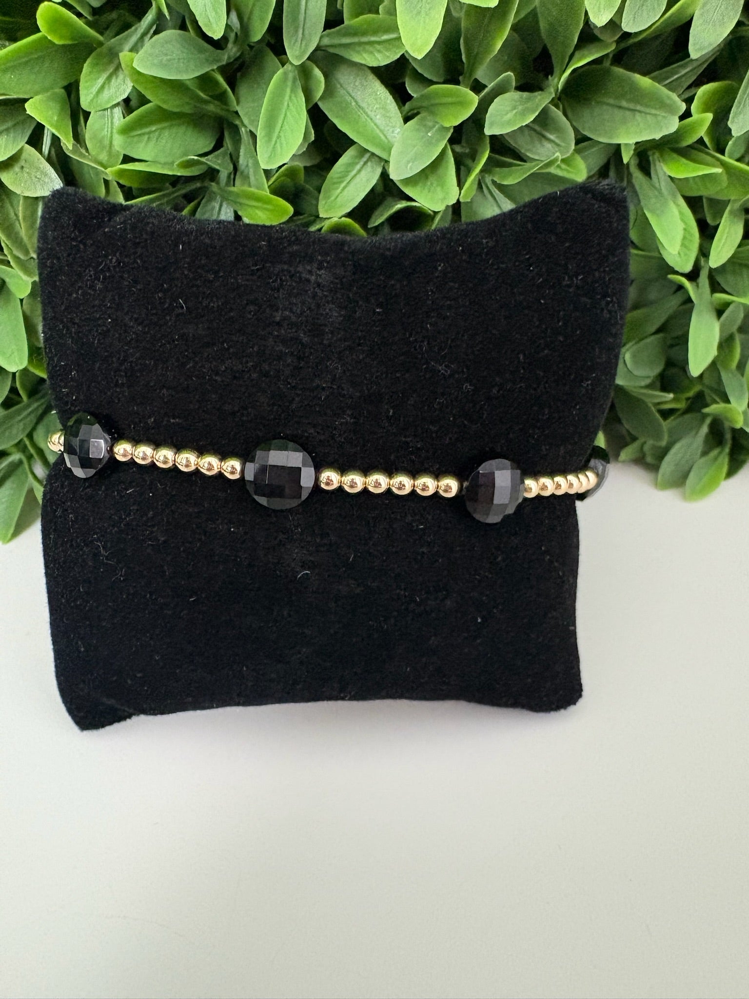 EXT ADMIRE GOLD 3MM BEAD BRAC - FACETED ONYX