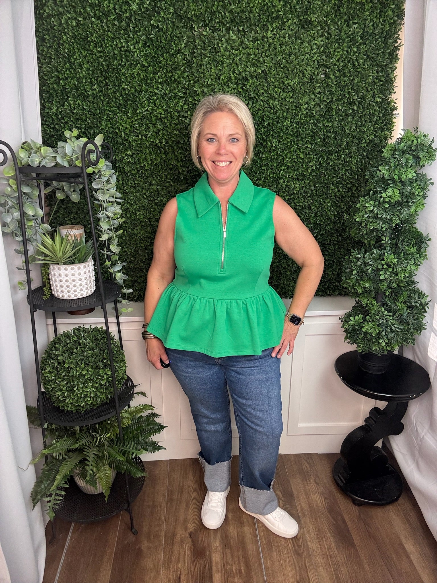 Green Sleeveless Zip Neck Peplum Top