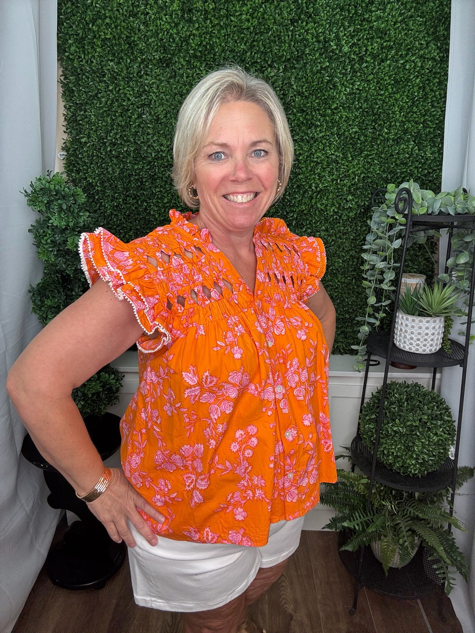 ORANGE BLOUSE WITH CUTOUTS