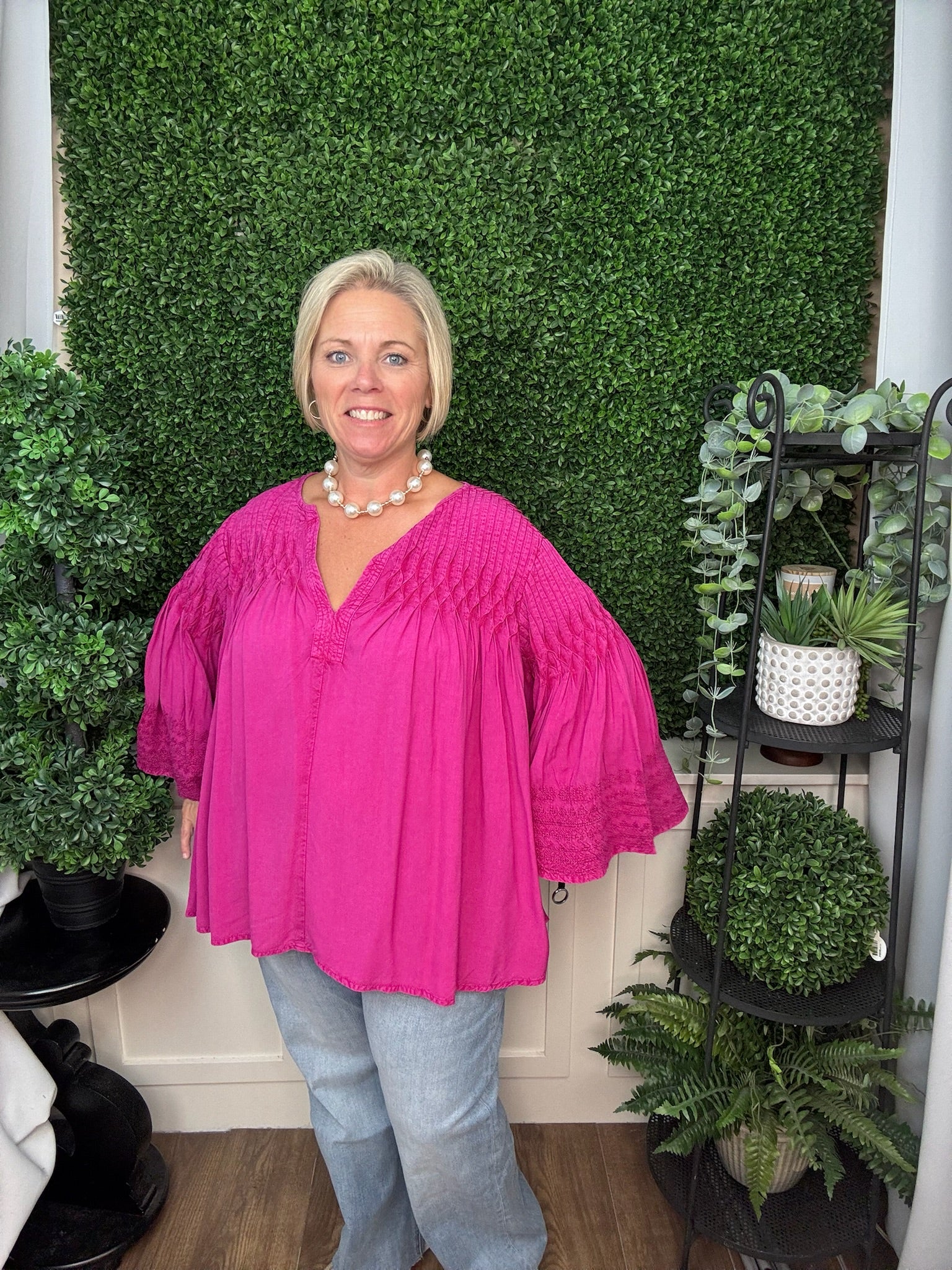 SPLIT NECK TUCKED TOP WITH EMBROIDERED SLEEVES - FUSCHIA