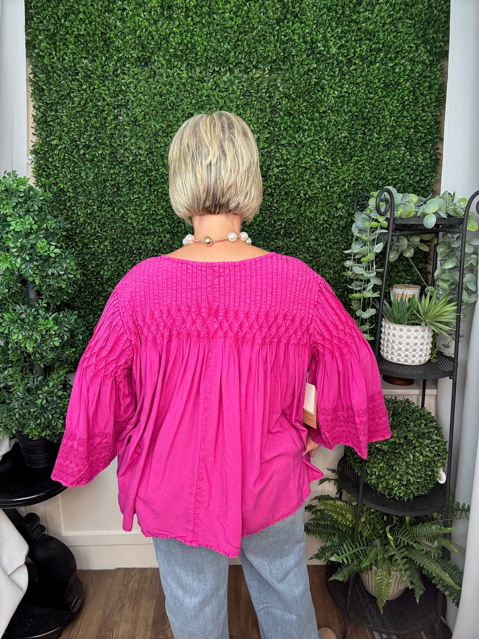 SPLIT NECK TUCKED TOP WITH EMBROIDERED SLEEVES - FUSCHIA