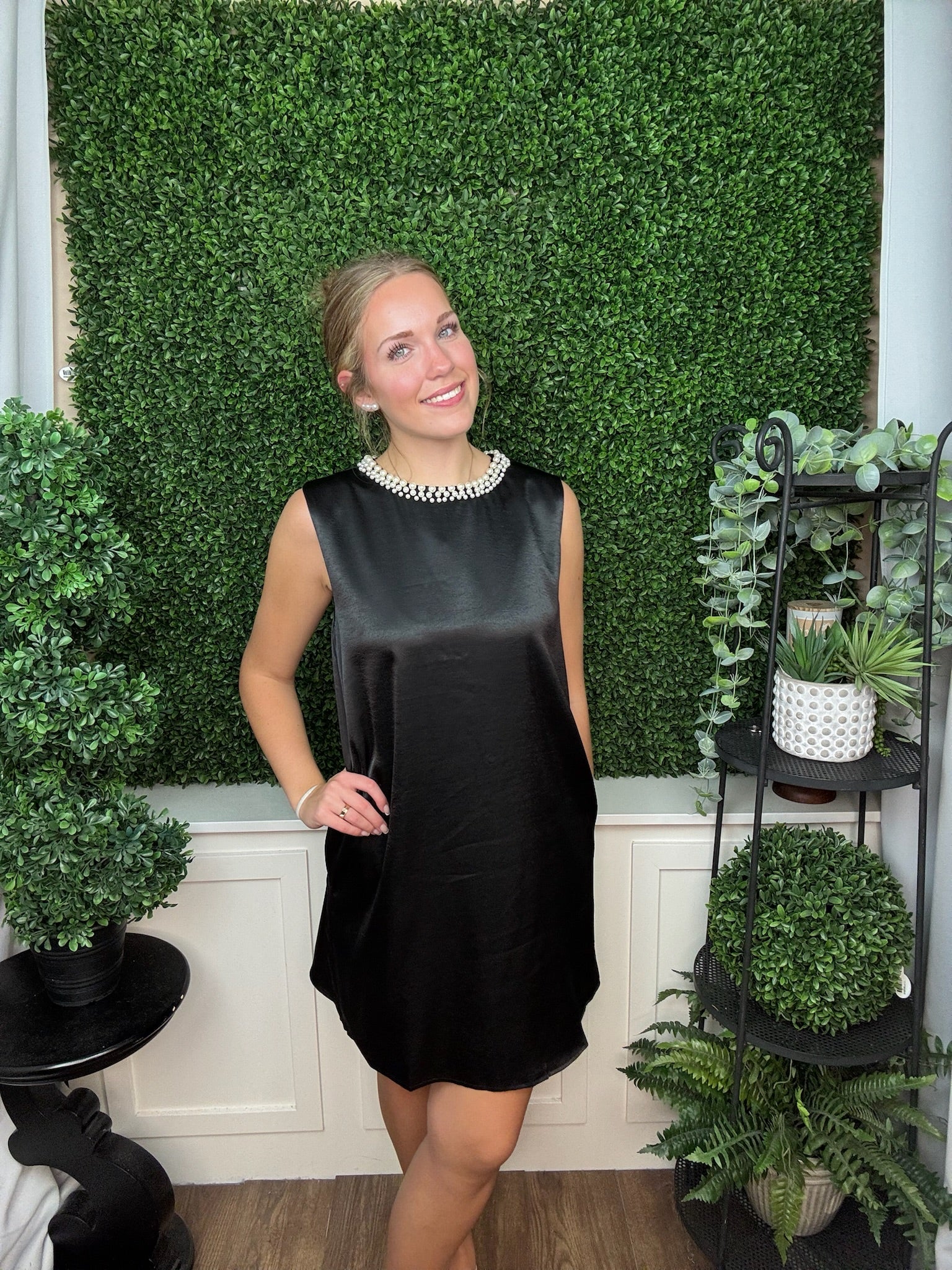 SLEEVELESS FAUX PEARL EMBELLISHED NECKLINE SATIN MINI DRESS WITH SIDE POCKET - BLACK