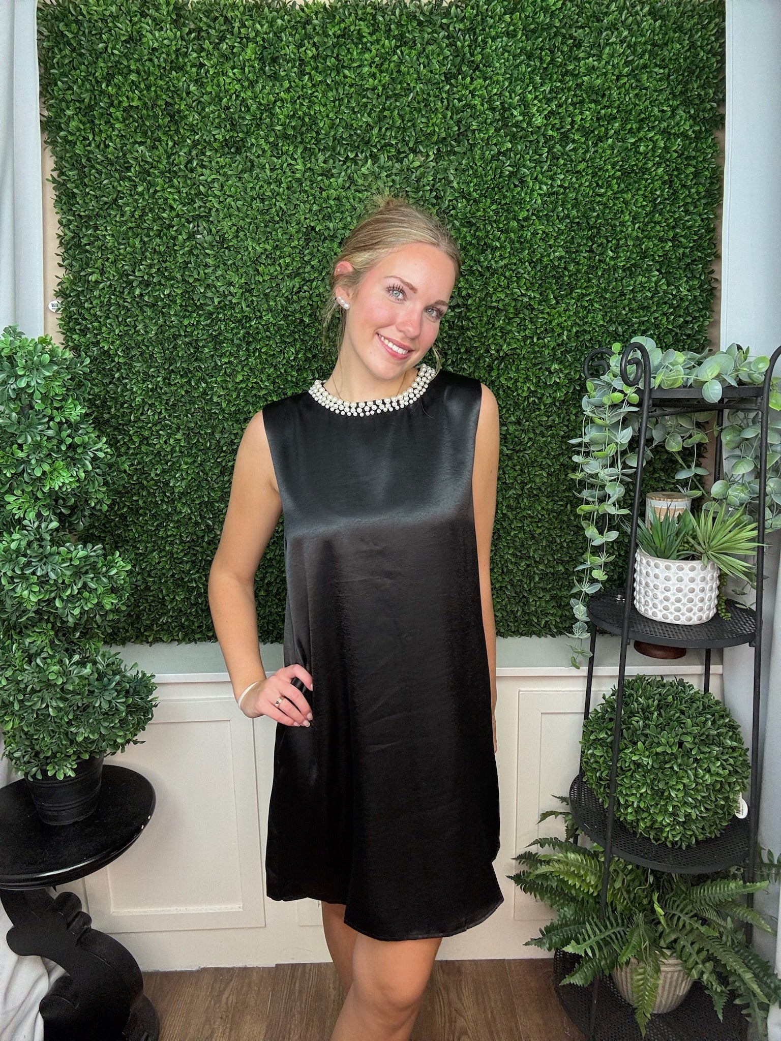 SLEEVELESS FAUX PEARL EMBELLISHED NECKLINE SATIN MINI DRESS WITH SIDE POCKET - BLACK