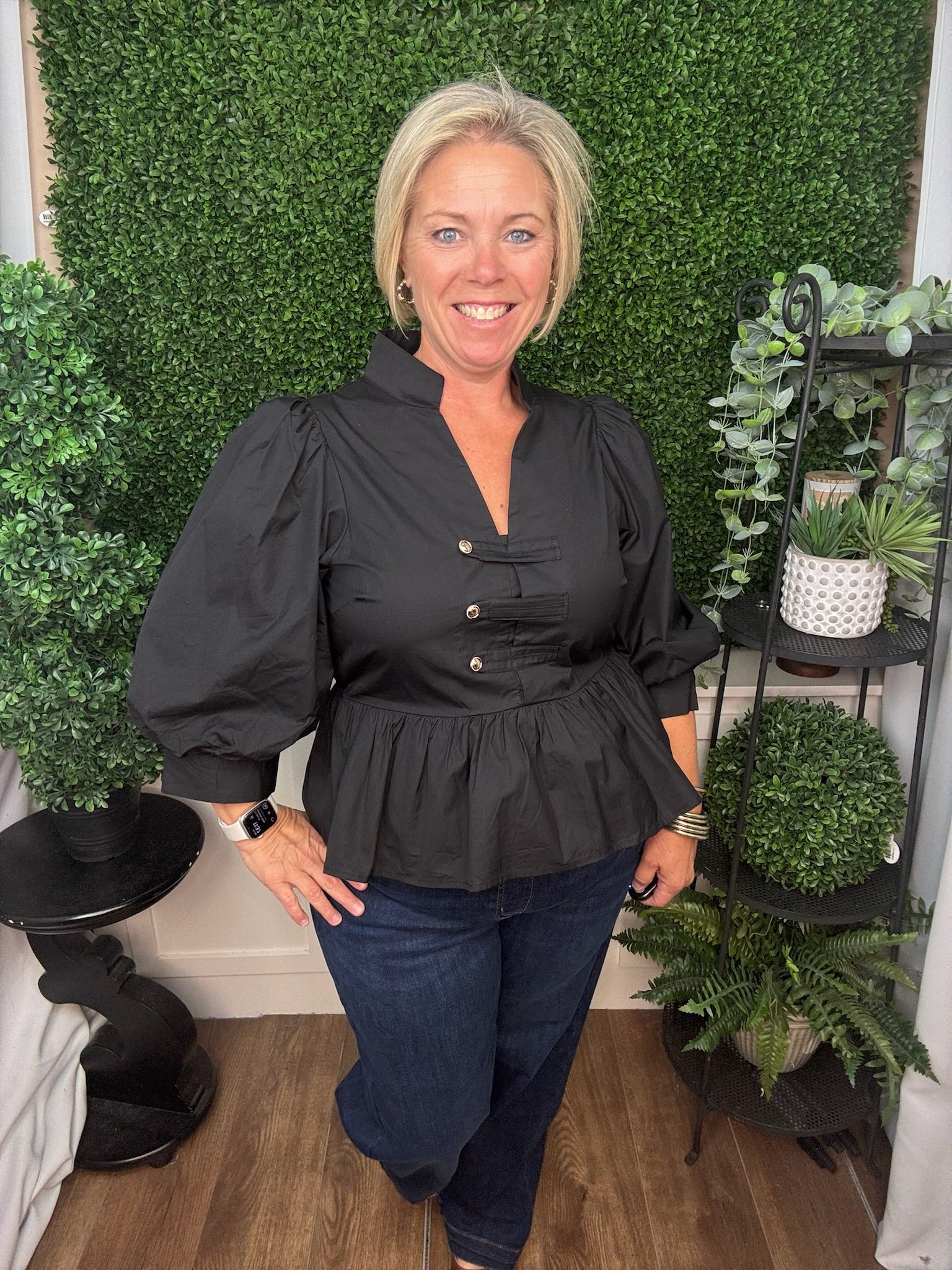COLLARED TOP WITH BUTTON TAB DETAIL AND PEPLUM HEM - BLACK