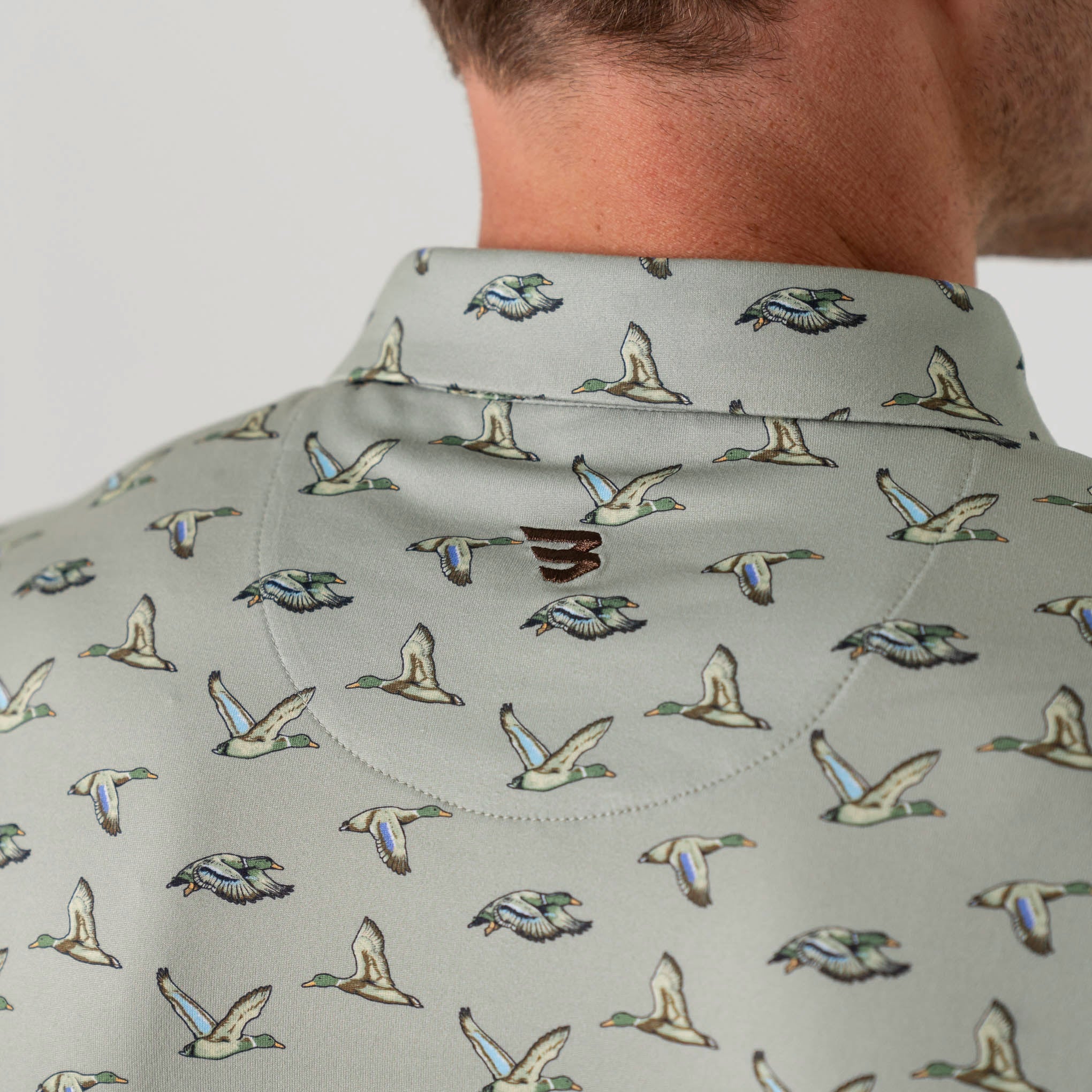 PERFORMANCE POLO - FLYING DUCKS - GREEN