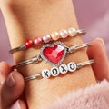 HEART BANGLE W/RED CRYSTAL